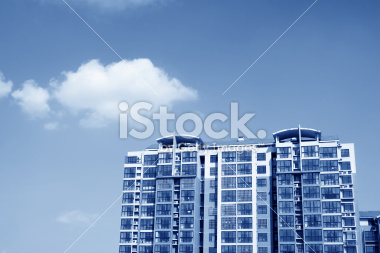stock-photo-36859114-high-rise-building-in-the-blue-sky
